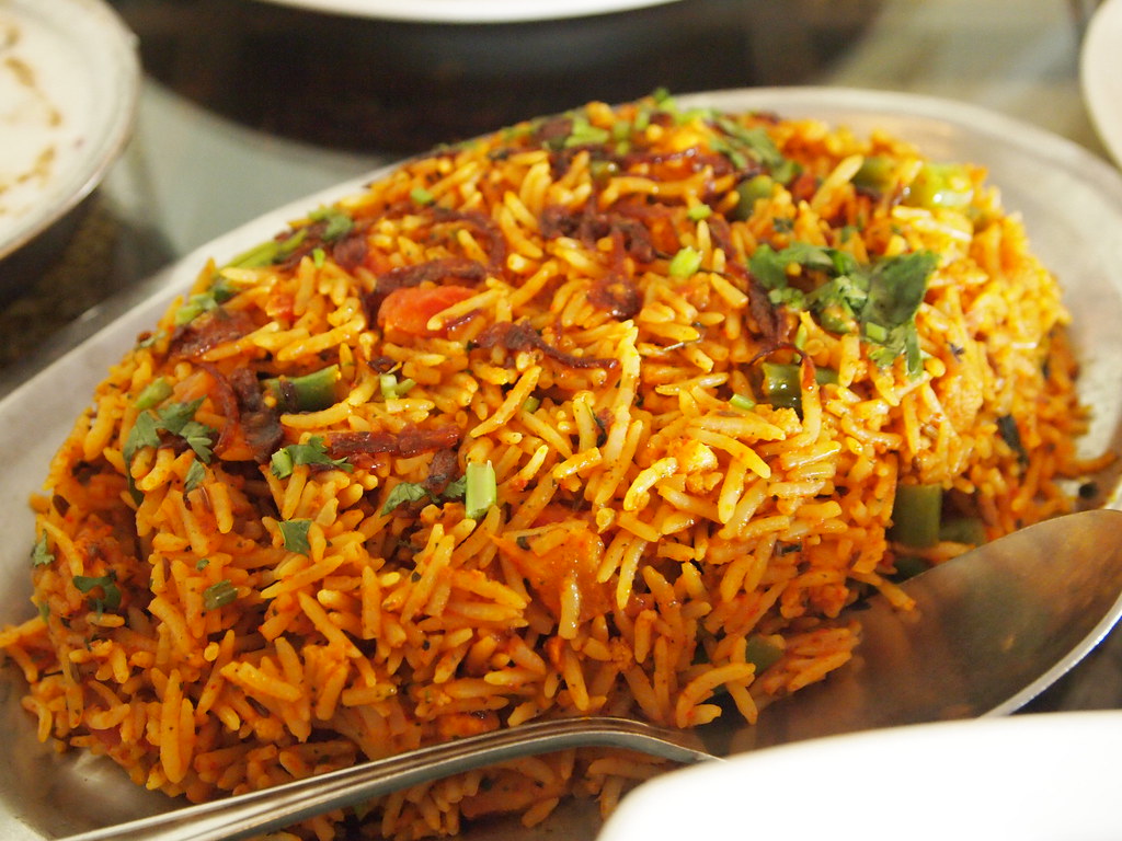 Vegetable dum biryani with mixed vegetables and herbs