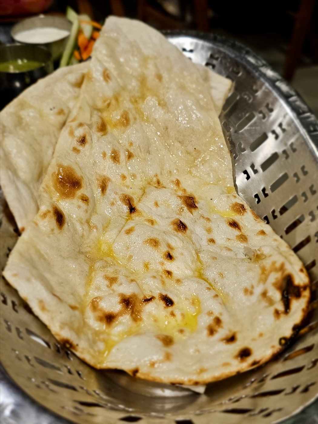Soft butter naan flatbread fresh from the tandoor