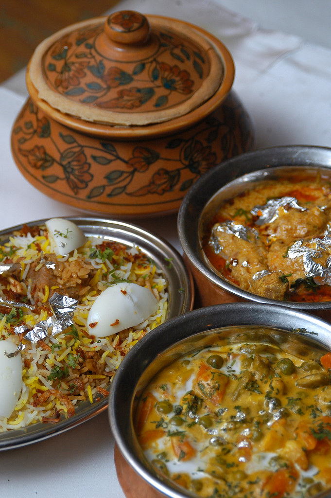 Hyderabadi biryani served with raita