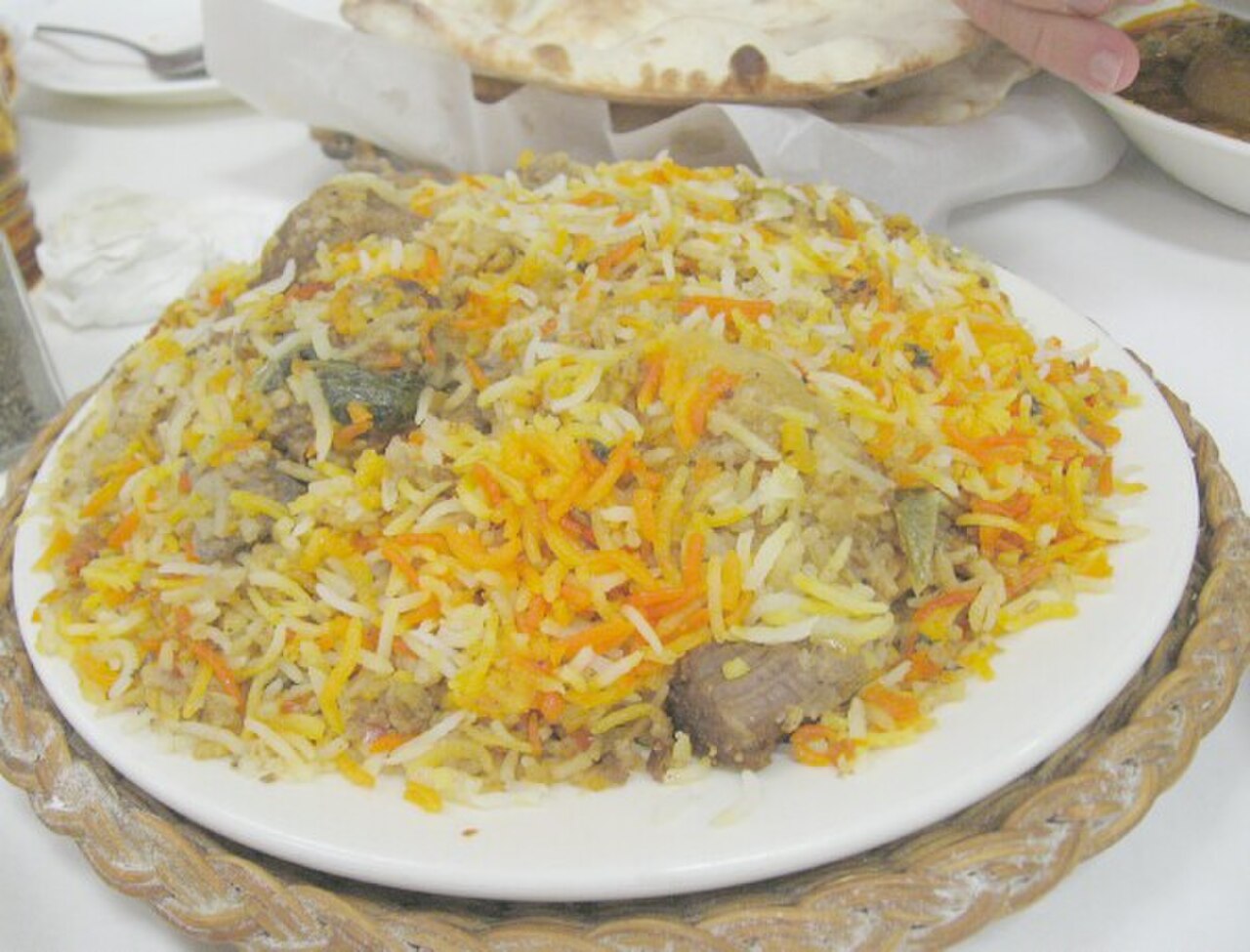 Mutton dum biryani with tender lamb and saffron basmati rice