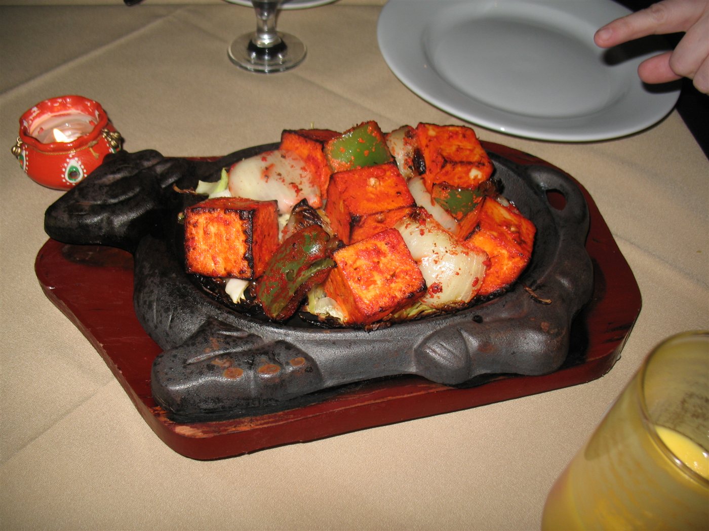 Paneer tikka, grilled marinated paneer cubes with peppers and onion